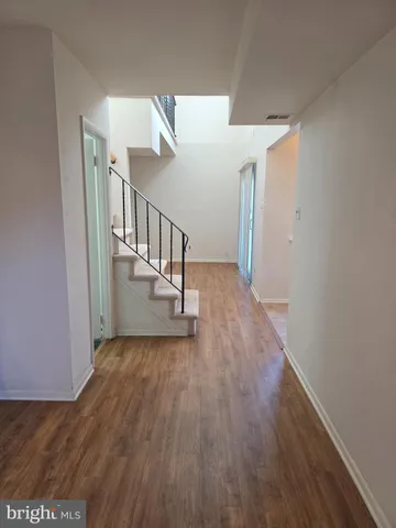 a view of entryway with wooden floor
