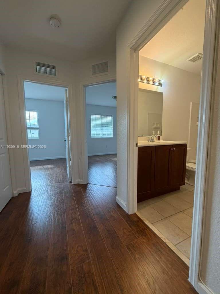 13982 Southwest 276th Street Homestead, FL 33032 - Photo 7 of 15 a view interior of a house and wooden floor