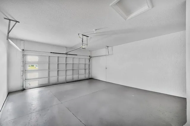 a bathroom with double sink and mirror