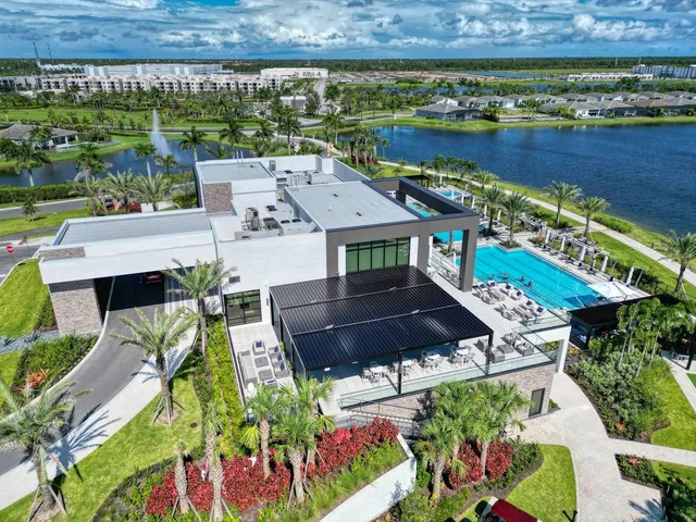 an aerial view of a house with a garden