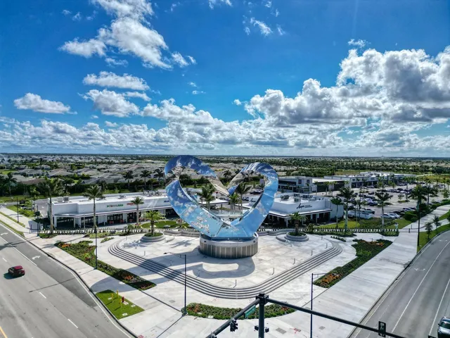 a view of a building with sitting area