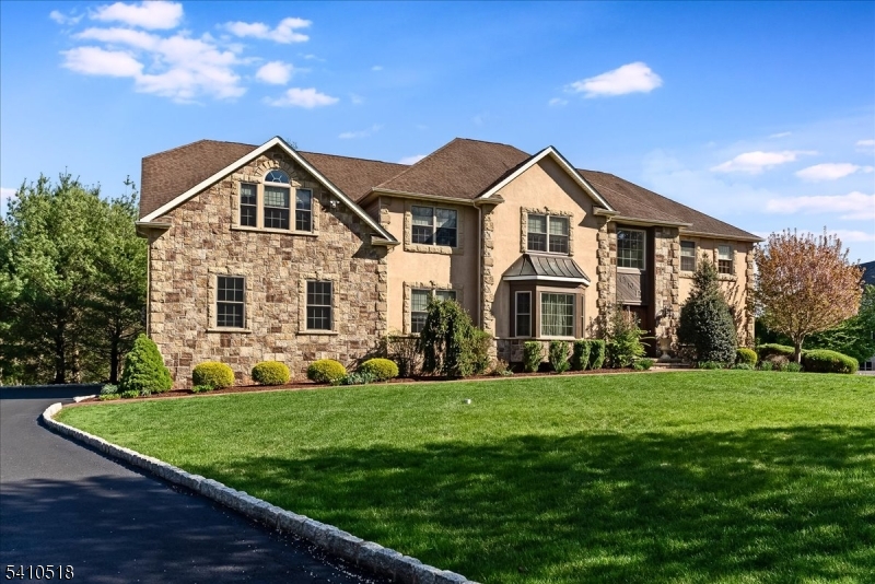 1 Brodziak Road Denville, NJ 07834 - Photo 2 of 42 a front view of a house with a yard