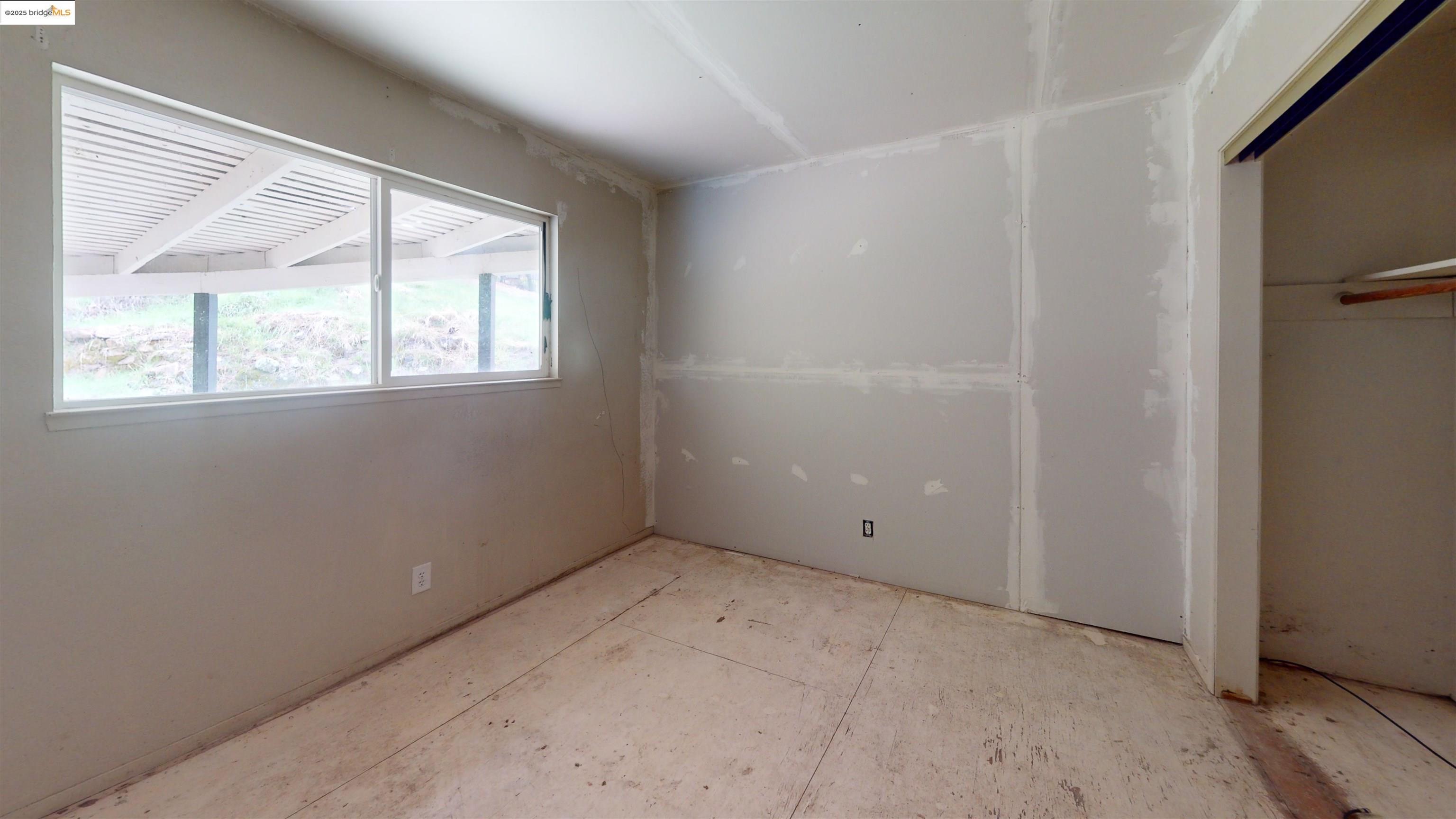 19817 Via Redonda Road Sonora, CA 95370 - Photo 12 of 23 Unfurnished bedroom featuring a closet