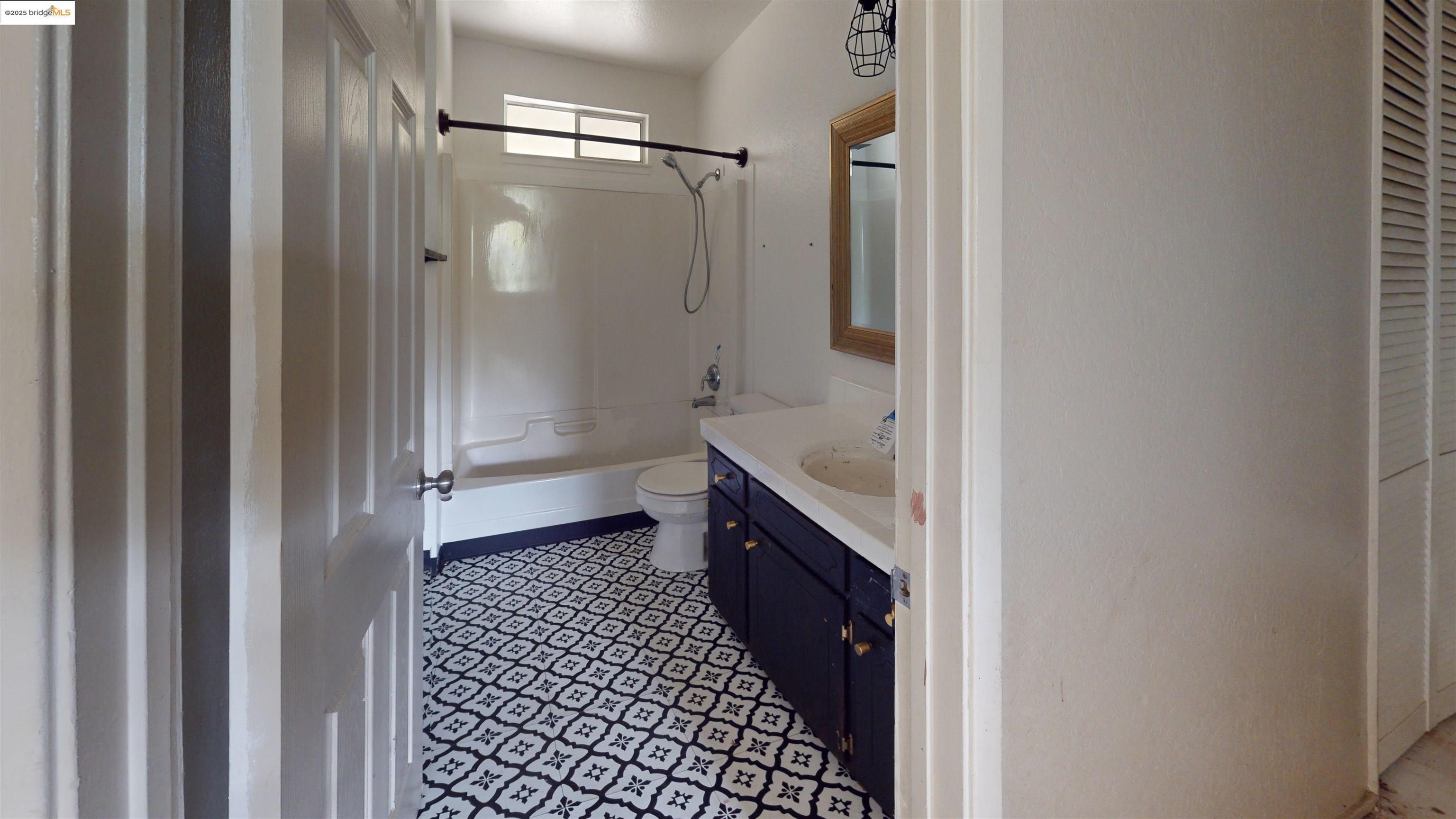 19817 Via Redonda Road Sonora, CA 95370 - Photo 15 of 23 Full bath featuring vanity, bathing tub / shower combination, and a closet