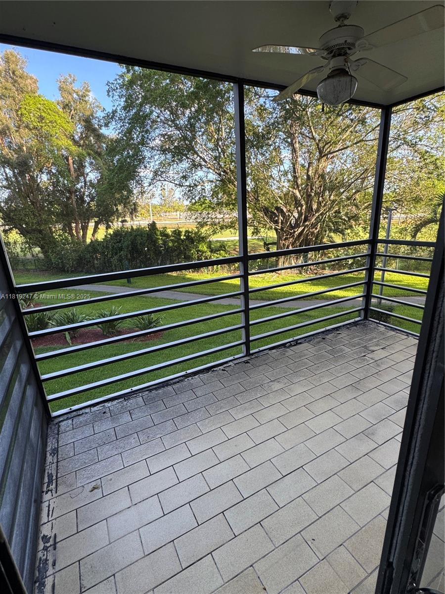 1100 St Charles Place, Unit 203 Pembroke Pines, FL 33026 - Photo 23 of 48 a view of outdoor space with seating area