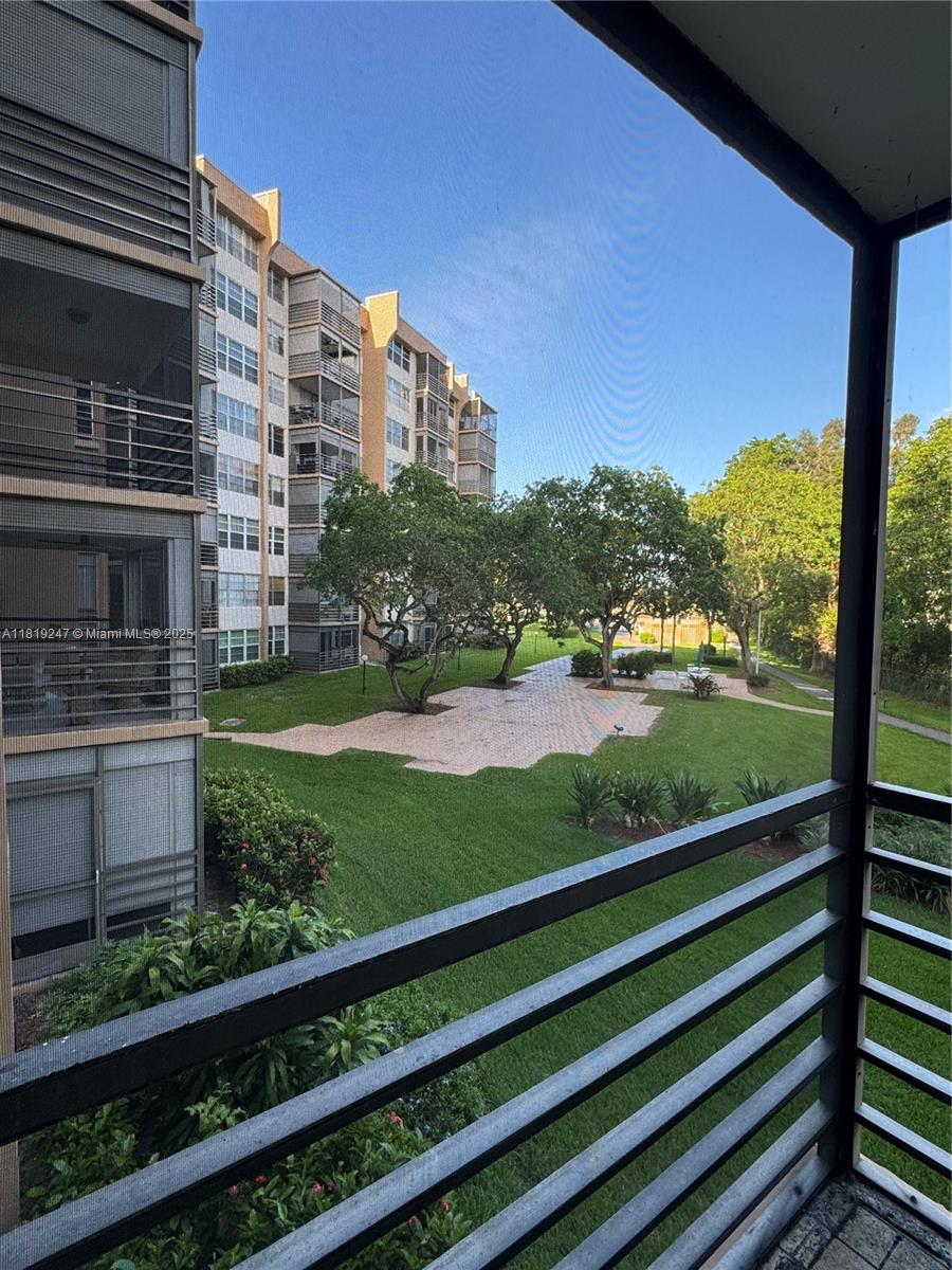 1100 St Charles Place, Unit 203 Pembroke Pines, FL 33026 - Photo 3 of 48 a view of a building from a window