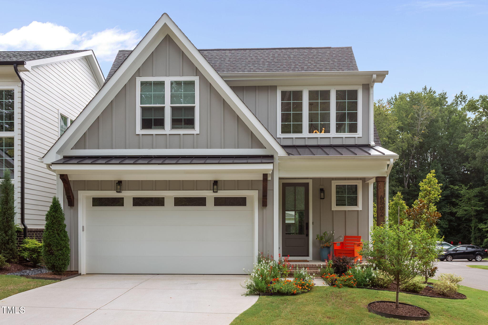 6502 Brecken Pines Raleigh, NC 27612 - Photo 1 of 42 a view of a house with garden