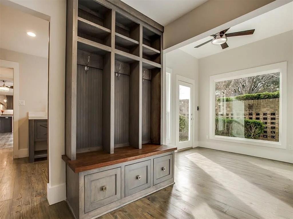4310 Forest Bend Road Dallas, TX 75244 - Photo 24 of 34 a view of an empty room with wooden floor and a window