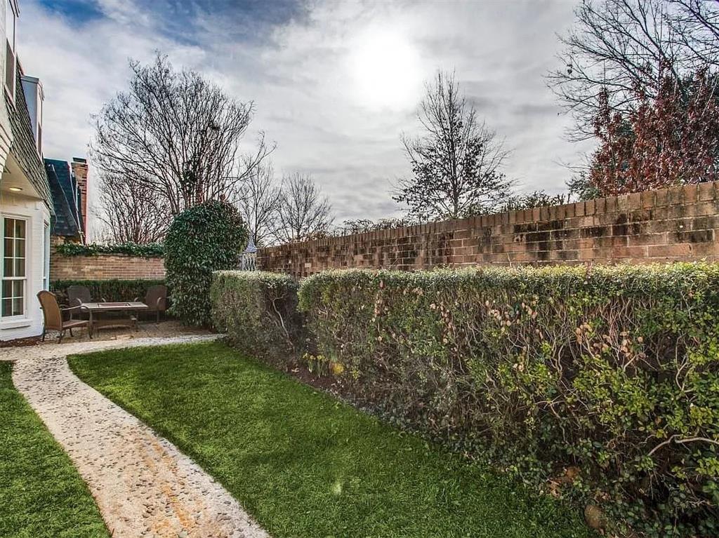 4310 Forest Bend Road Dallas, TX 75244 - Photo 29 of 34 a view of a backyard with large trees
