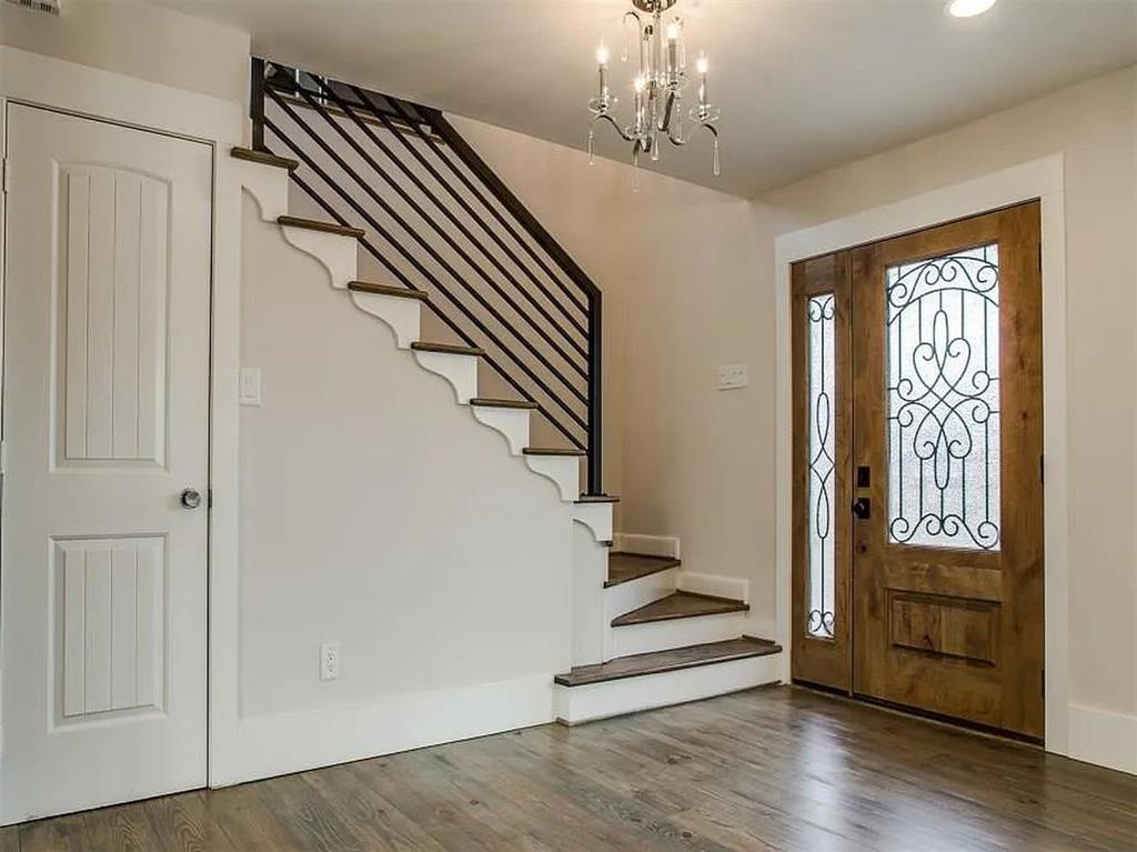 4310 Forest Bend Road Dallas, TX 75244 - Photo 5 of 34 a view of entryway with wooden floor and stairs