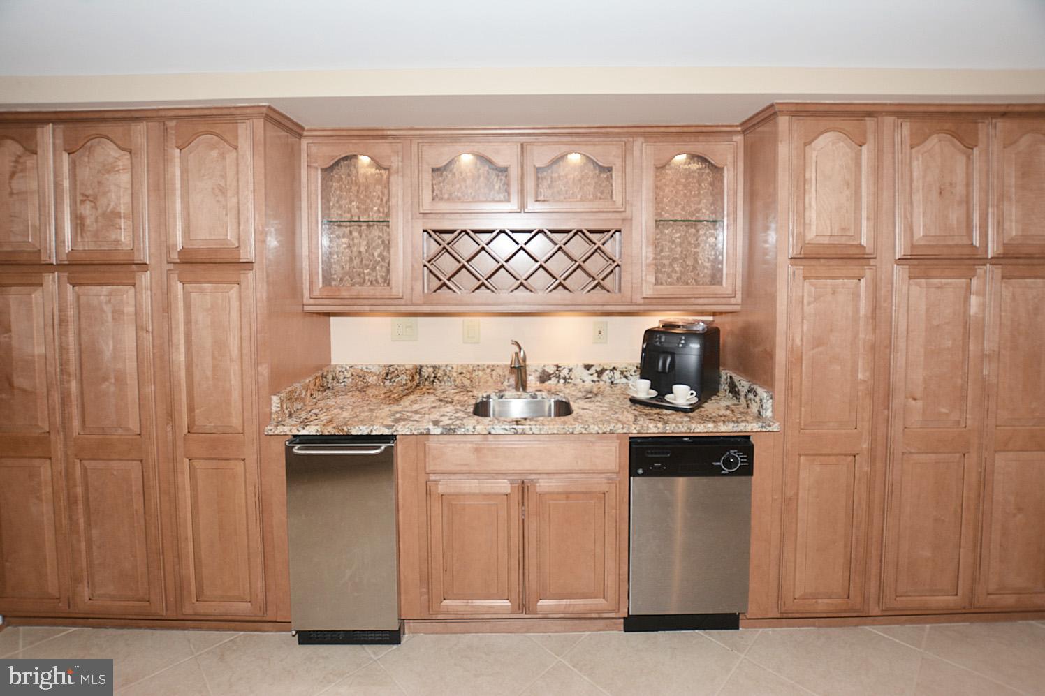 9963 Meadowlark Road Vienna, VA 22182 - Photo 31 of 39 Wet Bar with Ice and Refrigeration