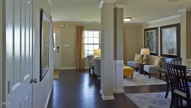 a view of a livingroom with furniture and windows