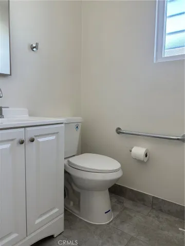 an empty room with a empty space and windows