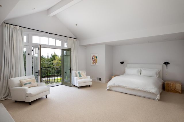 a view of a swimming pool with a yard