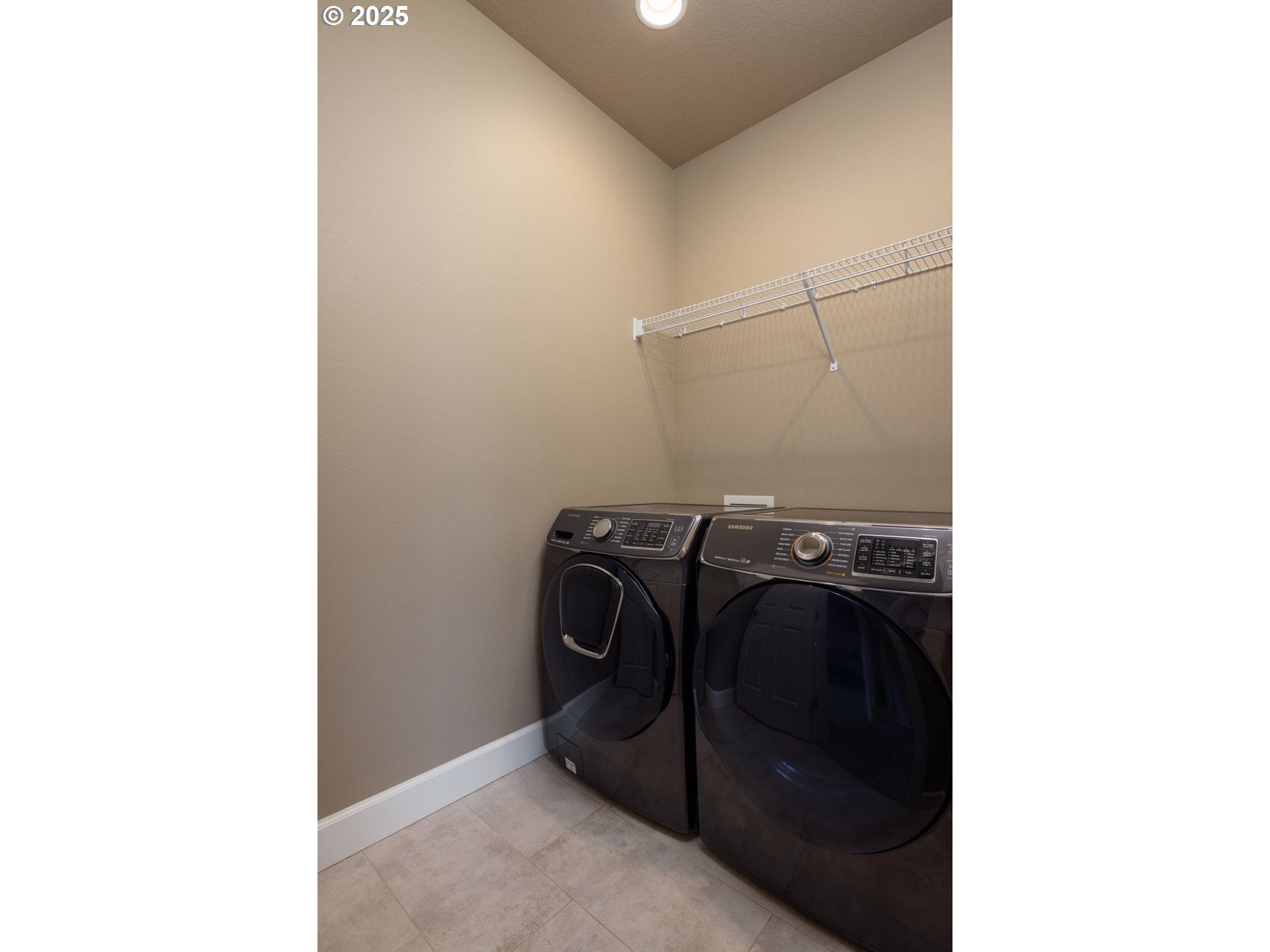 62905 Daniel Road Bend, OR 97701 - Photo 16 of 28 a view of storage and utility room with utility and racks