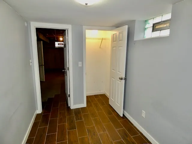 a view of a bathroom with a shower and a door