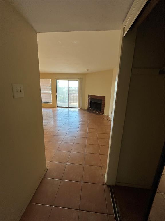 4460 Chaha Road, Unit 205 Garland, TX 75043 - Photo 3 of 27 a view of hallway with a couch