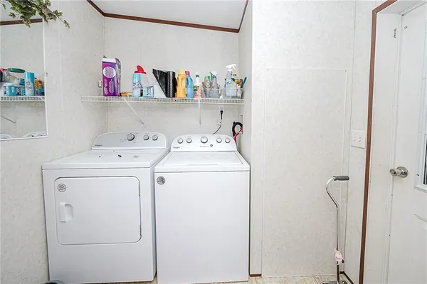 a balcony with view of living room