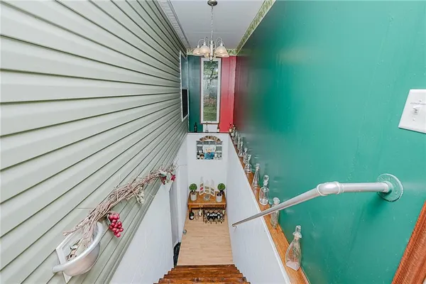 a room with lots of furniture and a gym equipment