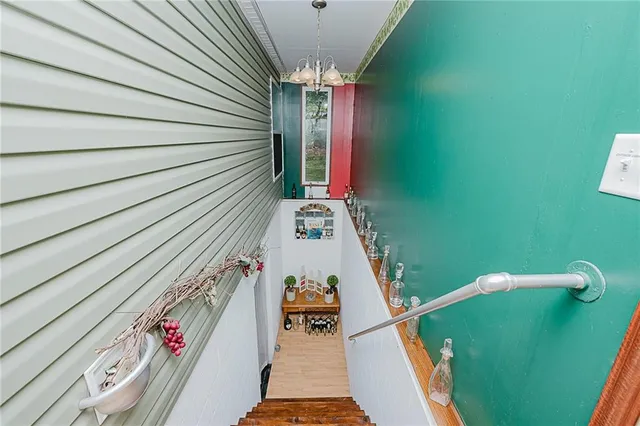 a room with lots of furniture and a gym equipment