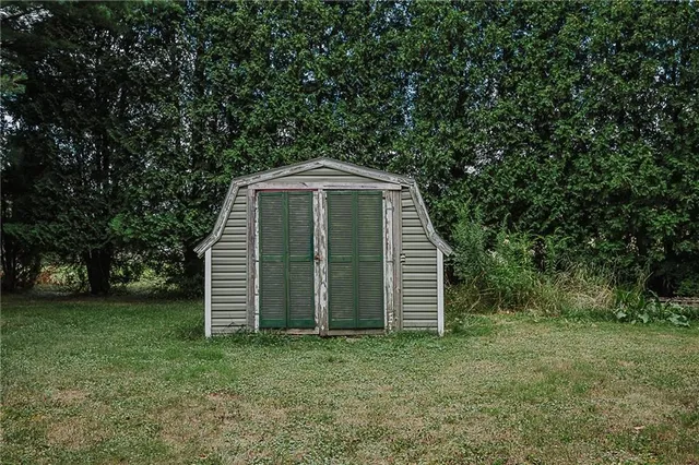a view of a field with a trees