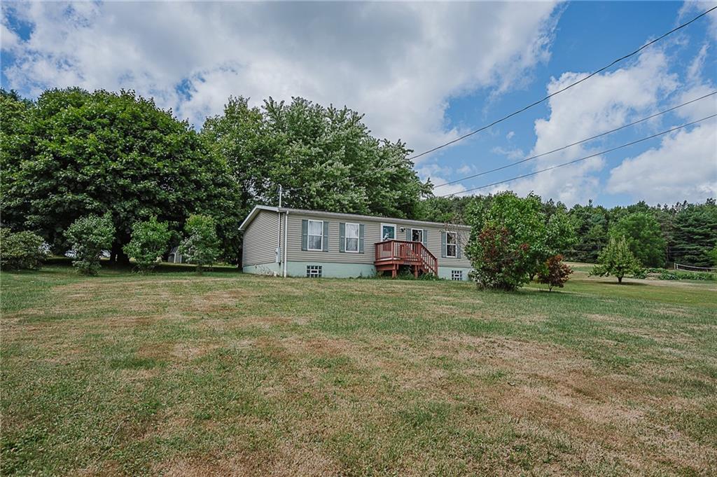 1171 Churchill Road Marion Center, PA 15759 - Photo 3 of 28 a fire hydrant in the middle of a field