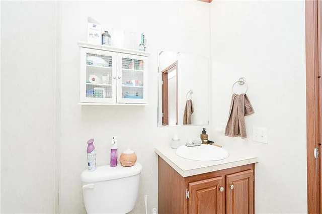 a bathroom with a sink and a toilet