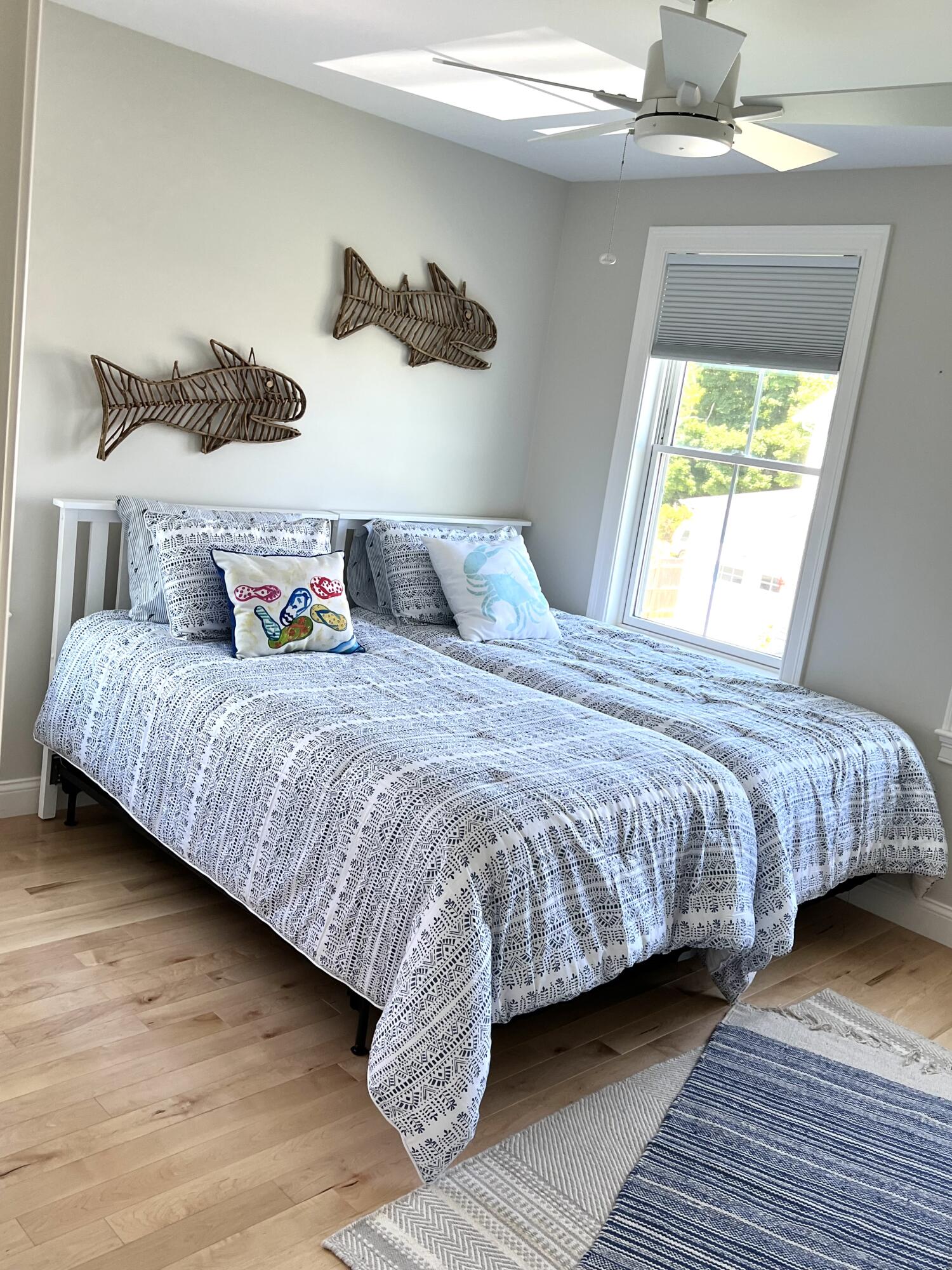 601 Ma Route, Unit 27 Dennis, MA 02638 - Photo 22 of 34 a bedroom with a bed and a window