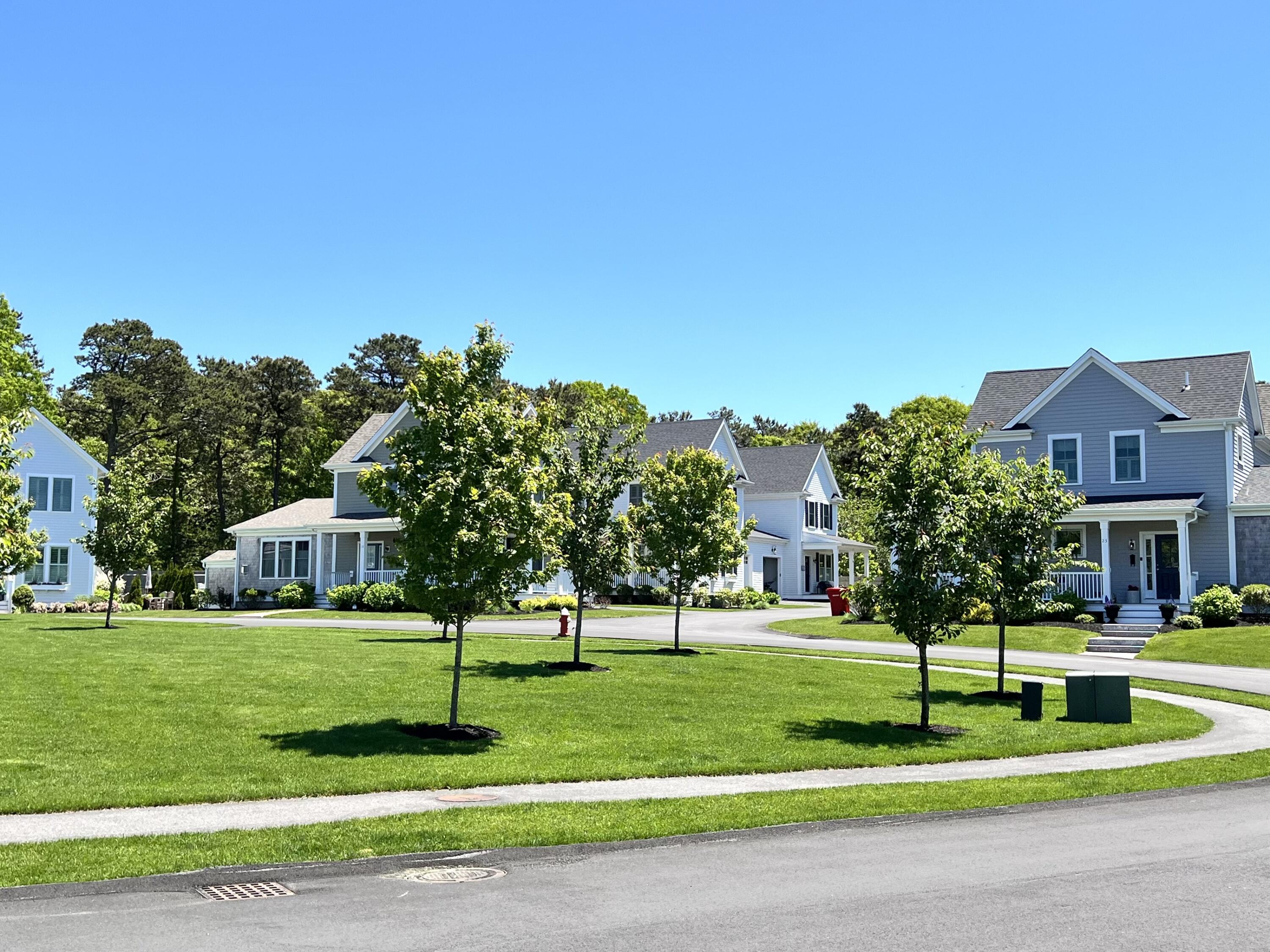 601 Ma Route, Unit 27 Dennis, MA 02638 - Photo 29 of 34 a front view of a house with a yard