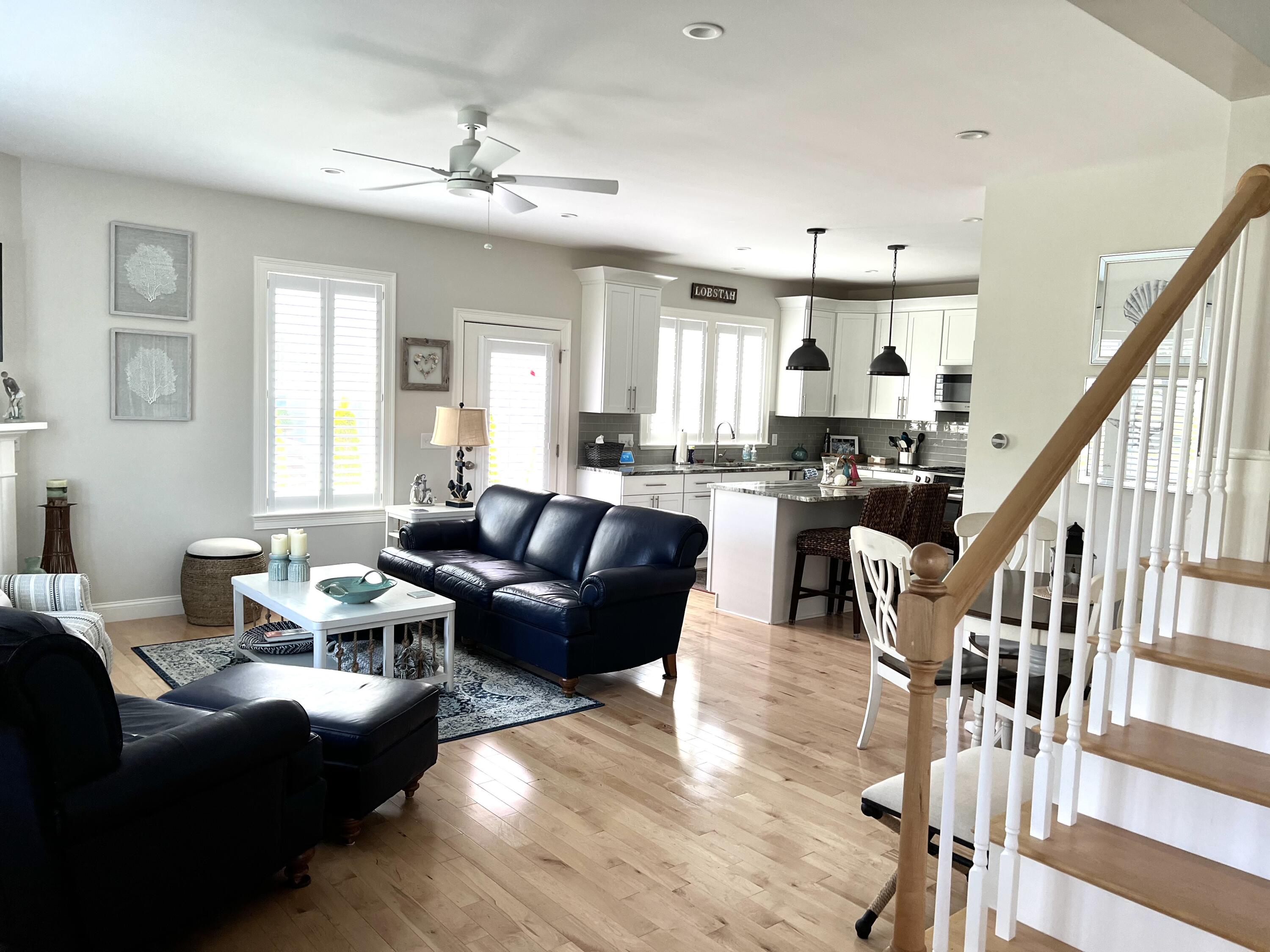 601 Ma Route, Unit 27 Dennis, MA 02638 - Photo 5 of 34 a living room with lots of furniture and white walls