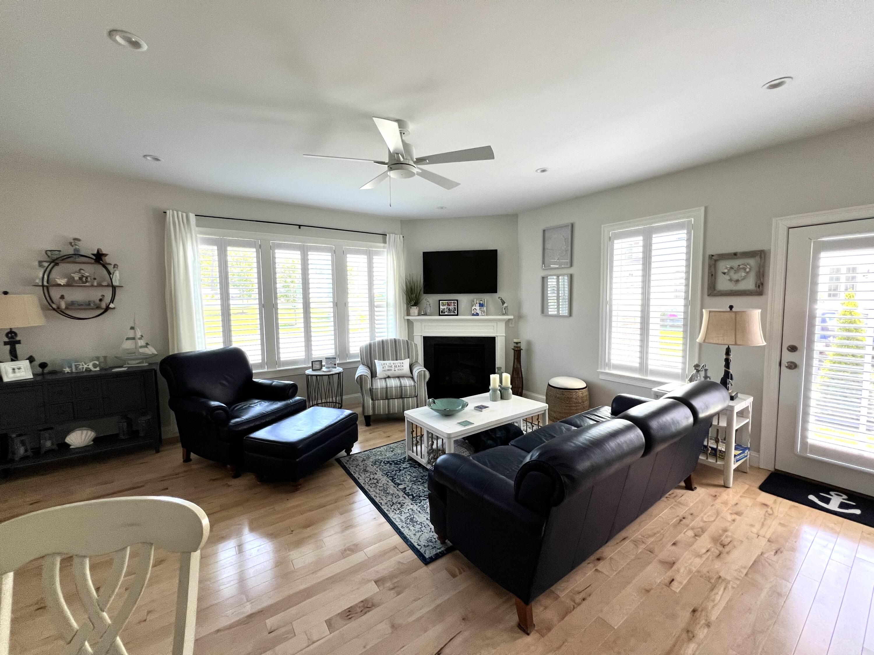 601 Ma Route, Unit 27 Dennis, MA 02638 - Photo 6 of 34 a living room with furniture fireplace and window