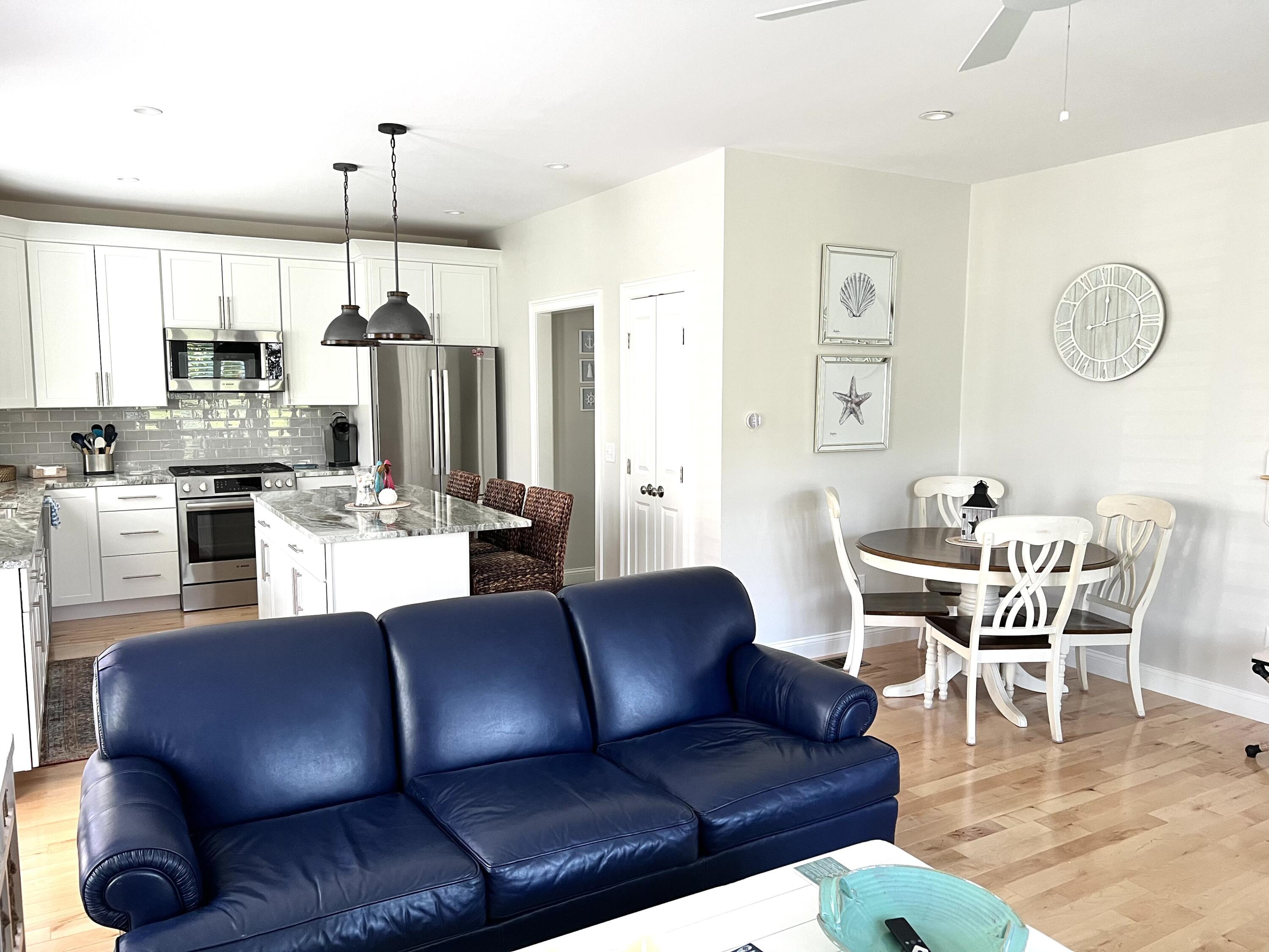 601 Ma Route, Unit 27 Dennis, MA 02638 - Photo 8 of 34 a view of a dining room with furniture