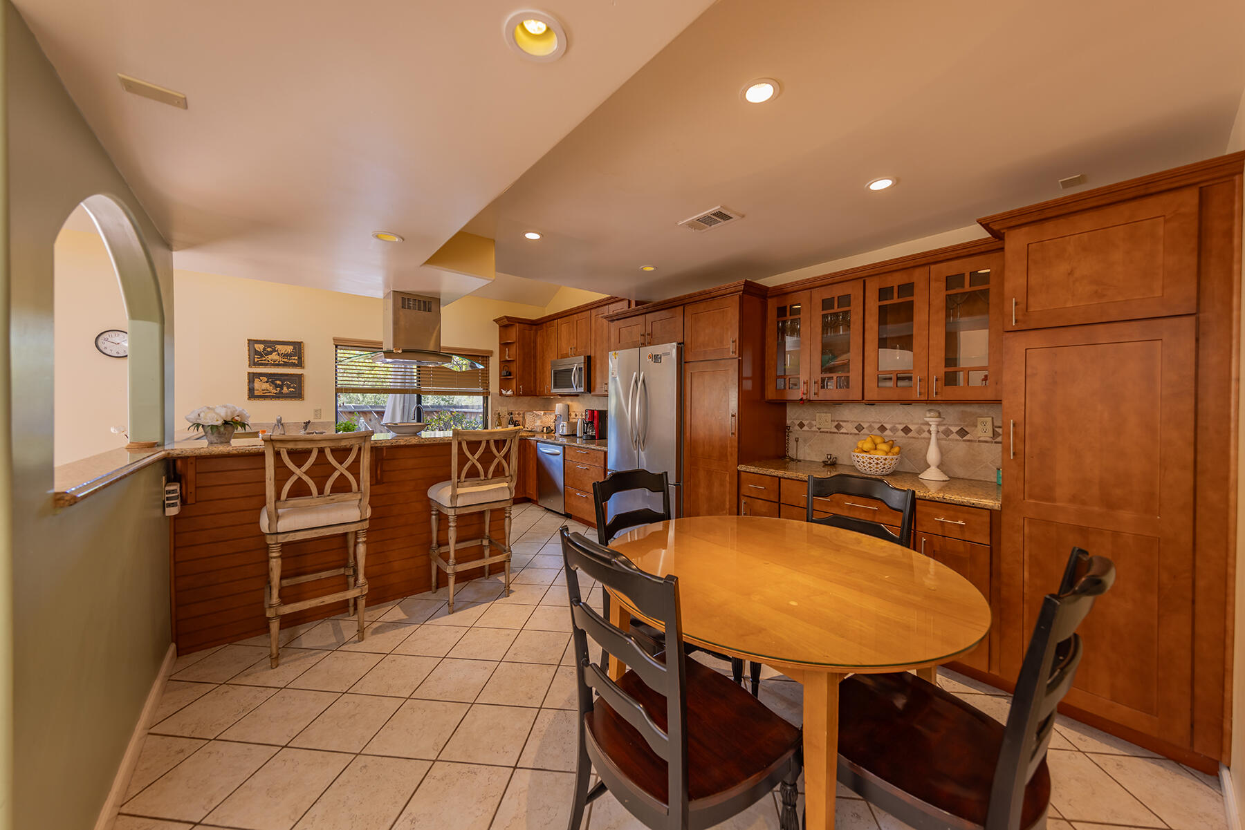 211 North Carrillo Road, Unit E Ojai, CA 93023 - Photo 11 of 27 a dining room with furniture and window