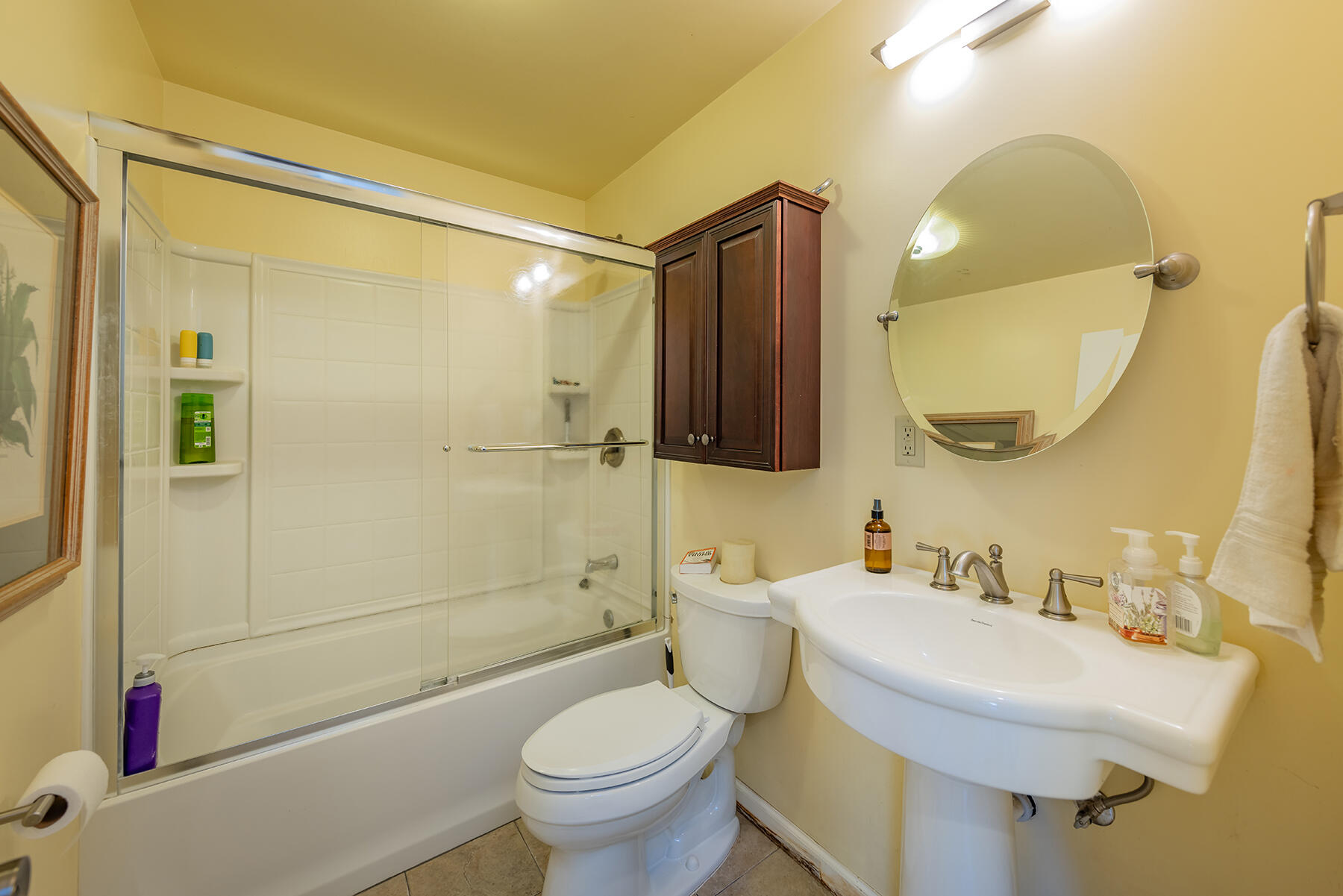 211 North Carrillo Road, Unit E Ojai, CA 93023 - Photo 20 of 27 a bathroom with a sink toilet and shower