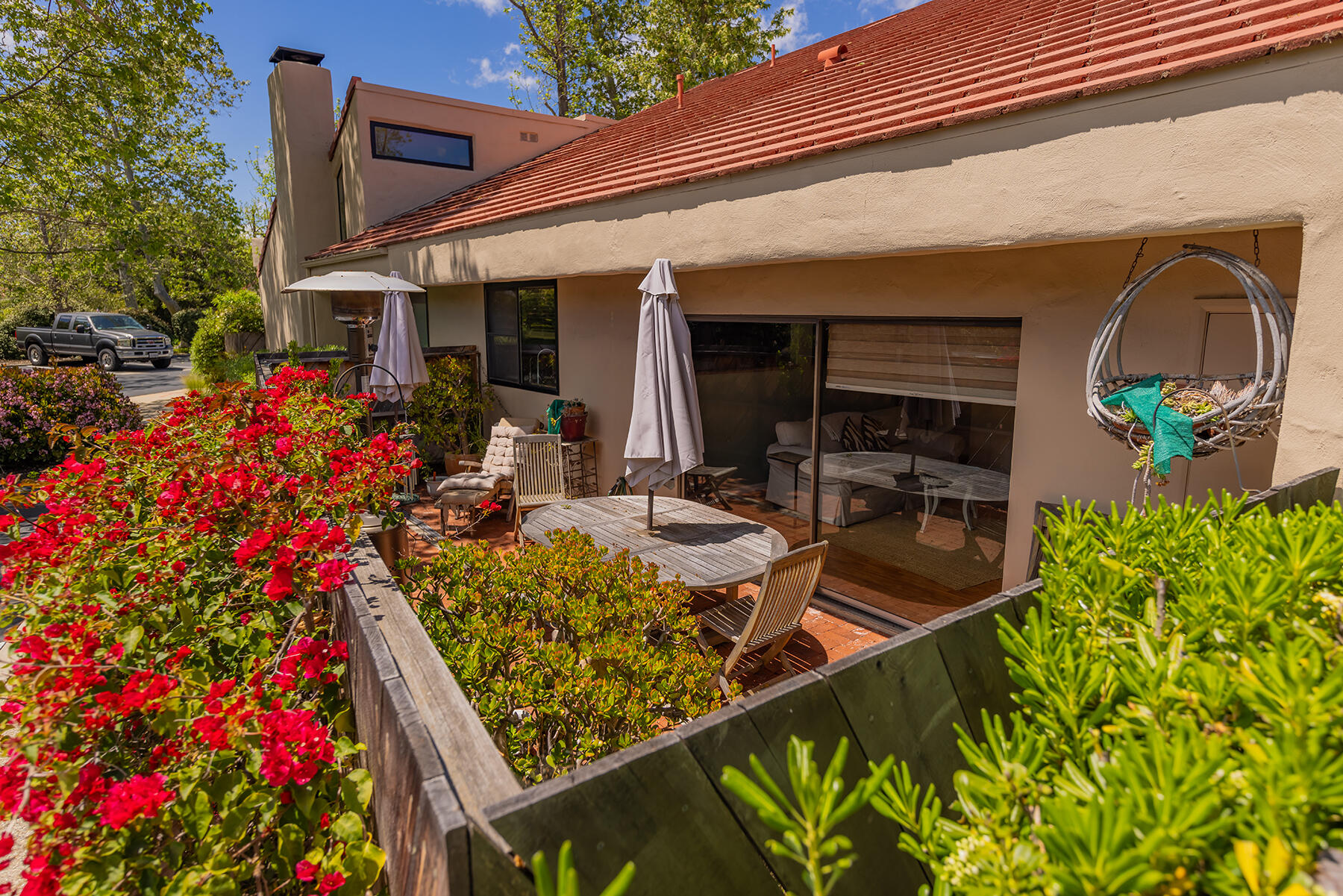 211 North Carrillo Road, Unit E Ojai, CA 93023 - Photo 21 of 27 a view of a chairs and table in a patio