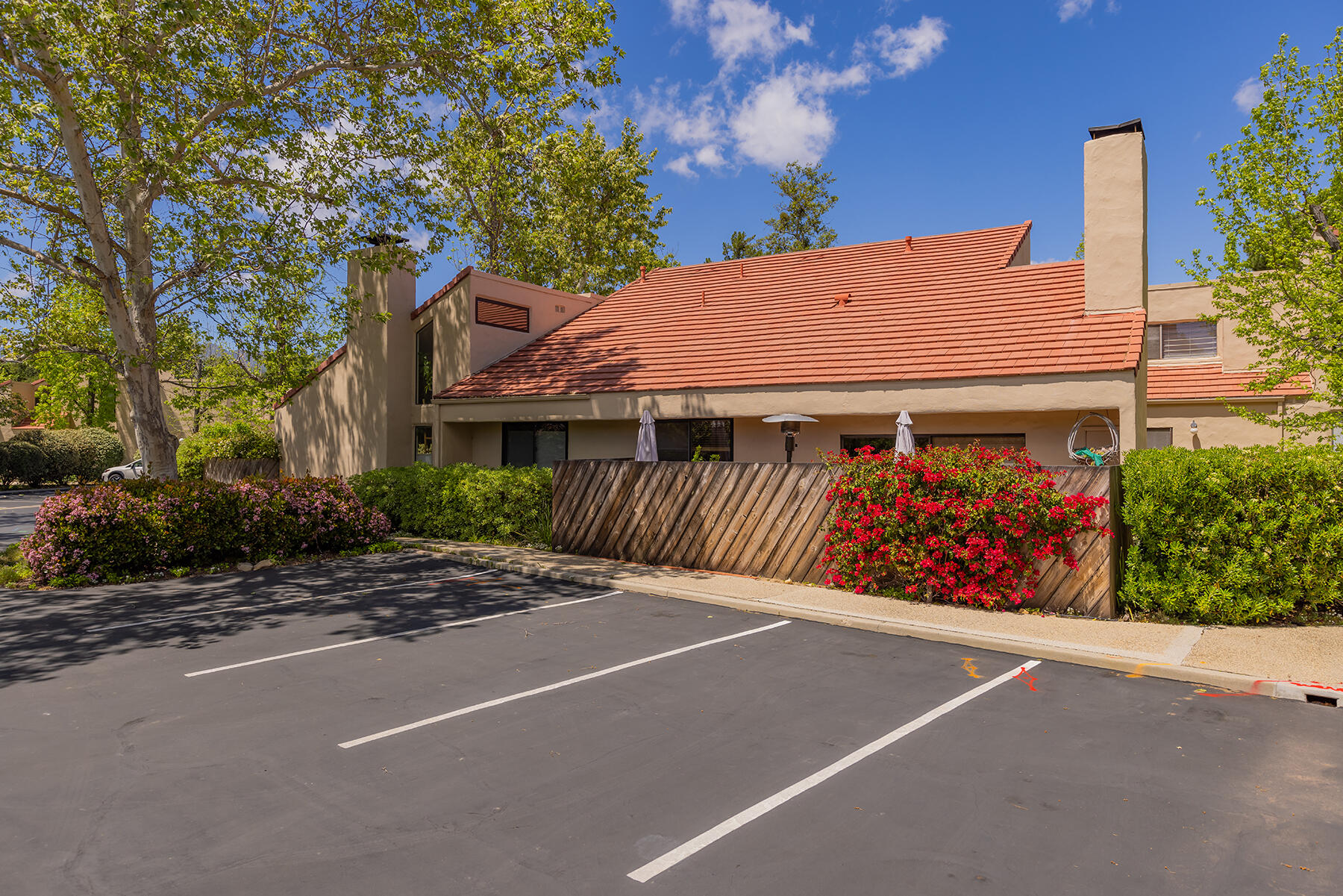 211 North Carrillo Road, Unit E Ojai, CA 93023 - Photo 26 of 27 a front view of a house with basket ball court