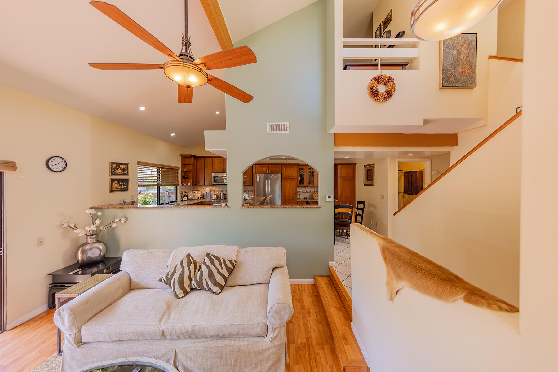 211 North Carrillo Road, Unit E Ojai, CA 93023 - Photo 4 of 27 a living room with furniture and a chandelier