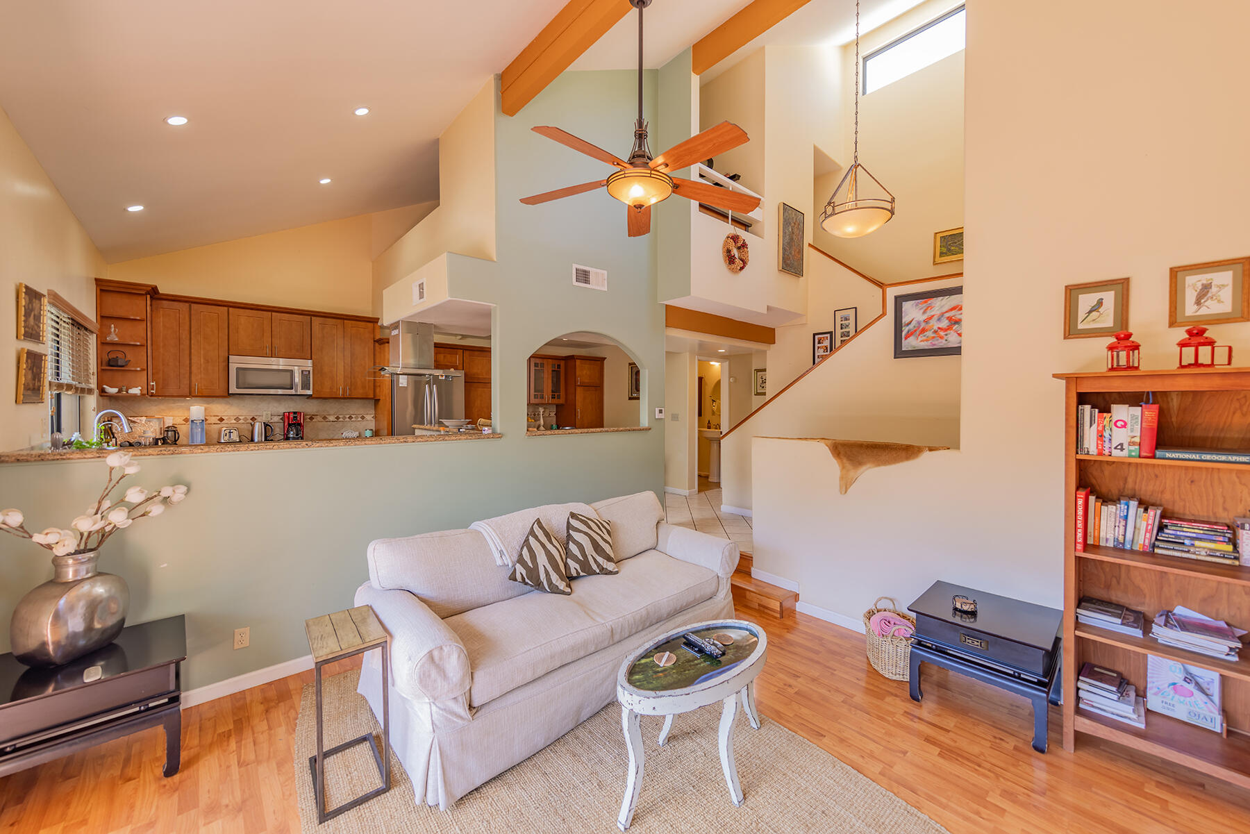 211 North Carrillo Road, Unit E Ojai, CA 93023 - Photo 5 of 27 a living room with furniture kitchen view and a wooden floor