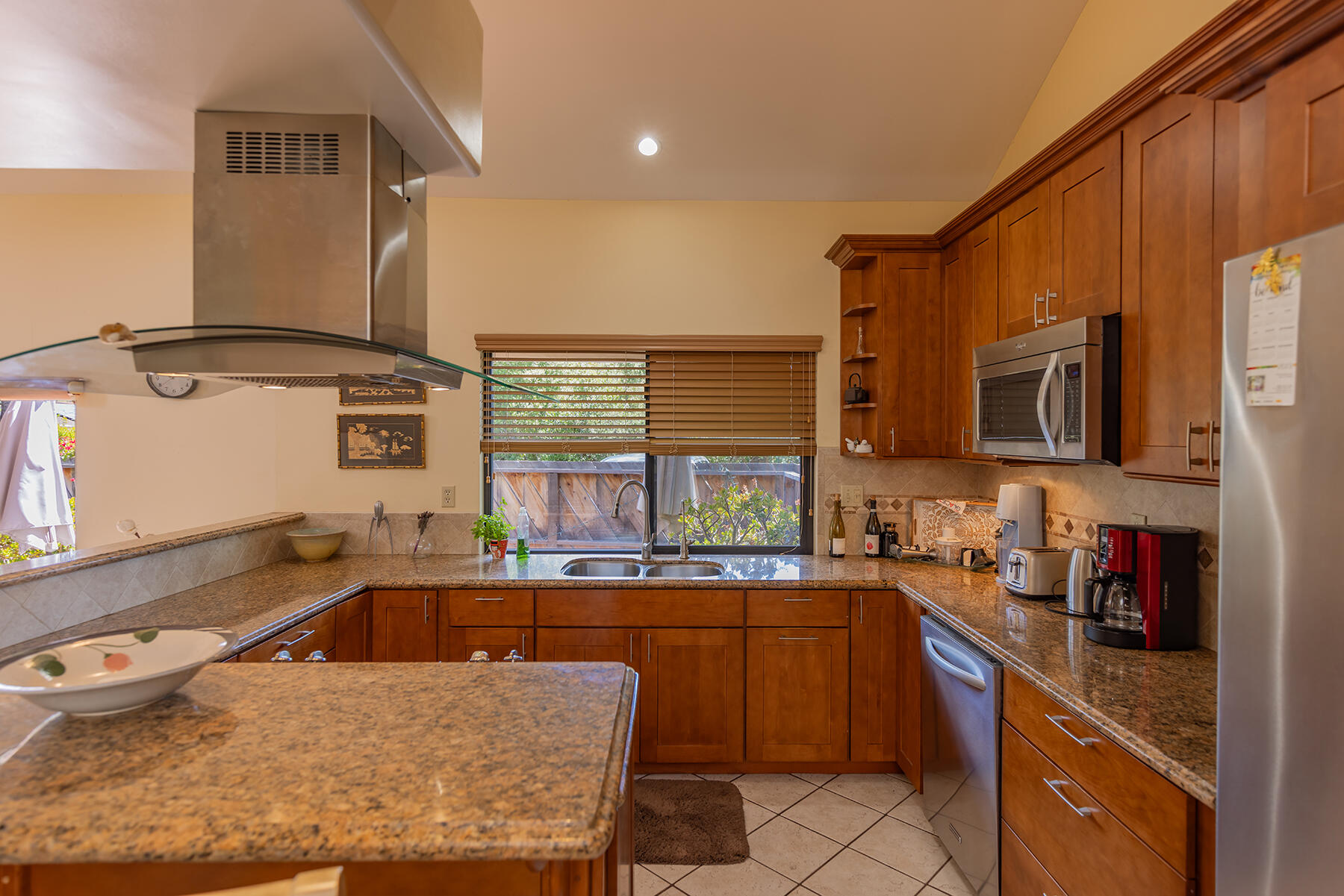 211 North Carrillo Road, Unit E Ojai, CA 93023 - Photo 10 of 27 a kitchen with a sink stove and microwave