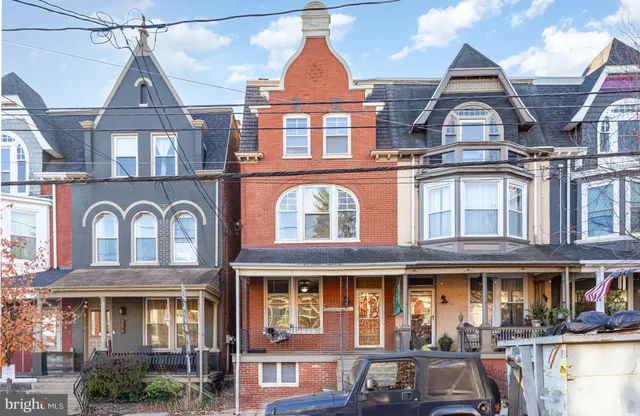 a front view of residential houses