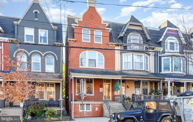 a picture of a room with a floor to ceiling window