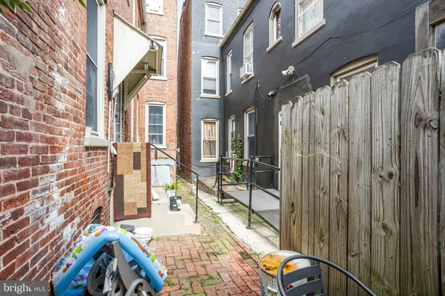 a view of balcony with furniture