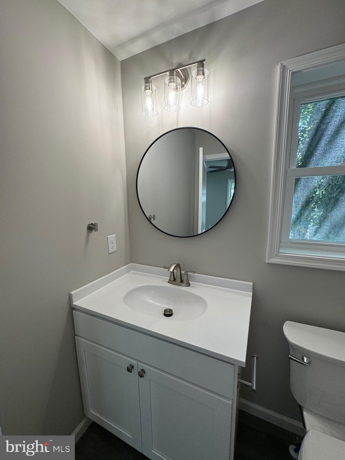 210 West 2nd Street Ridgely, MD 21660 - Photo 26 of 36 a bathroom with a sink and a mirror