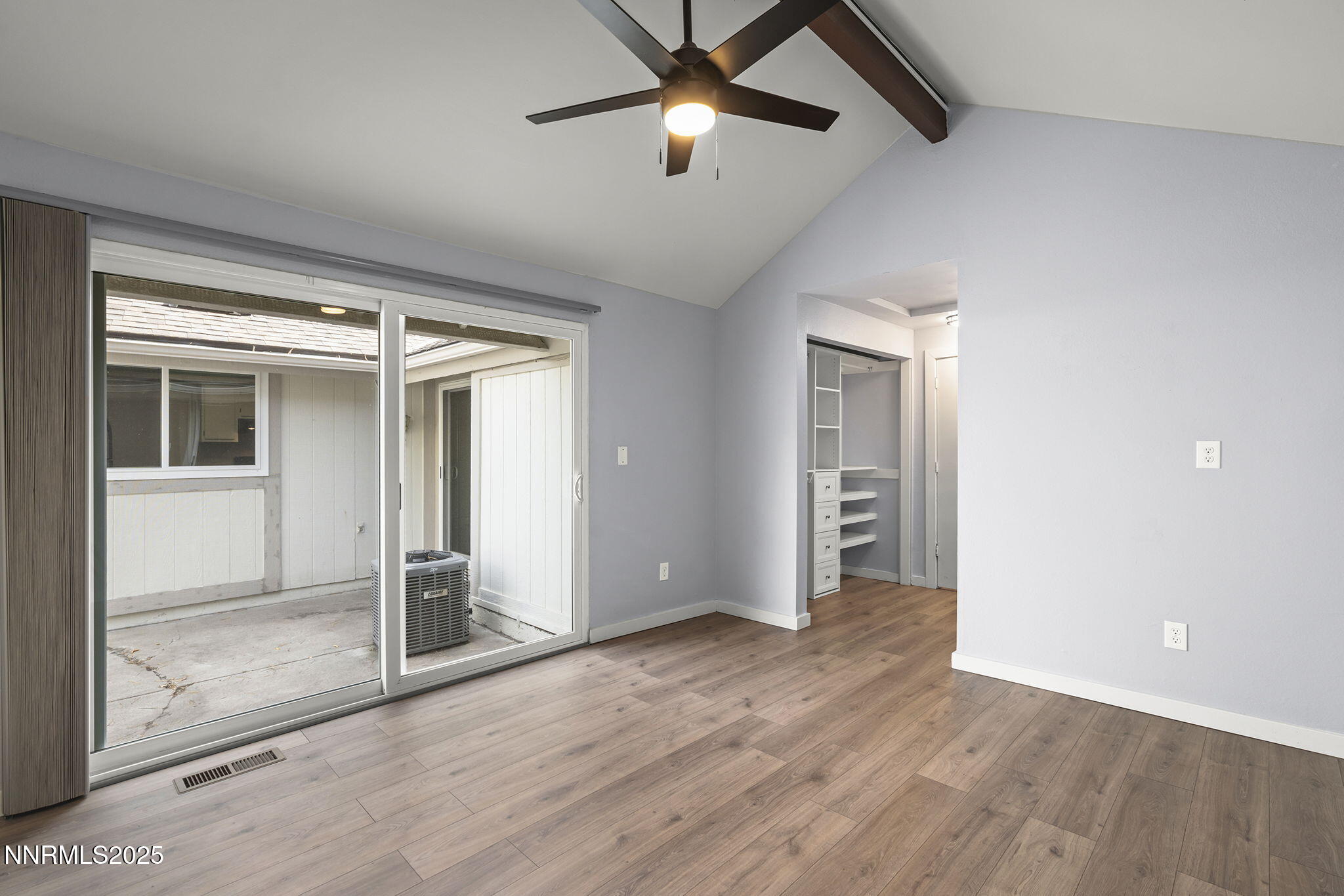 1149 Wagon Wheel Circle Reno, NV 89503 - Photo 11 of 19 a view of empty room with wooden floor and fan