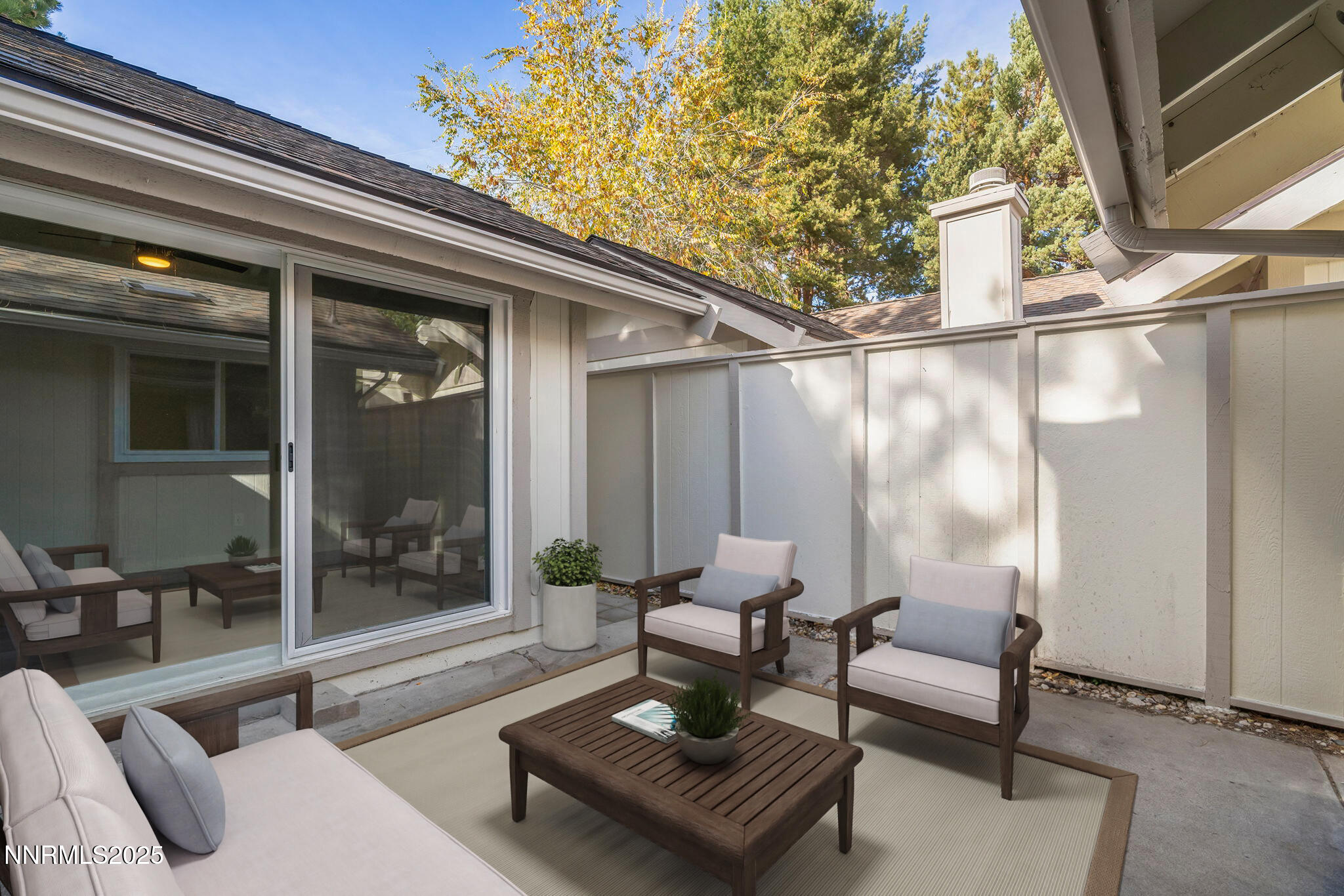 1149 Wagon Wheel Circle Reno, NV 89503 - Photo 12 of 19 a outdoor living space with furniture and a potted plant
