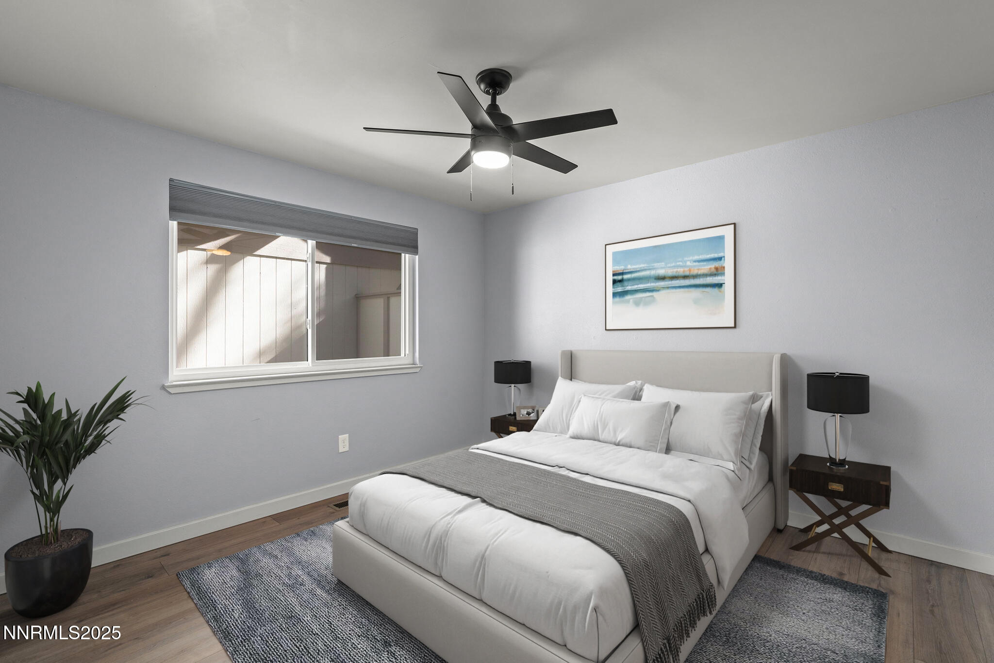 1149 Wagon Wheel Circle Reno, NV 89503 - Photo 14 of 19 a bedroom with a large bed and a window