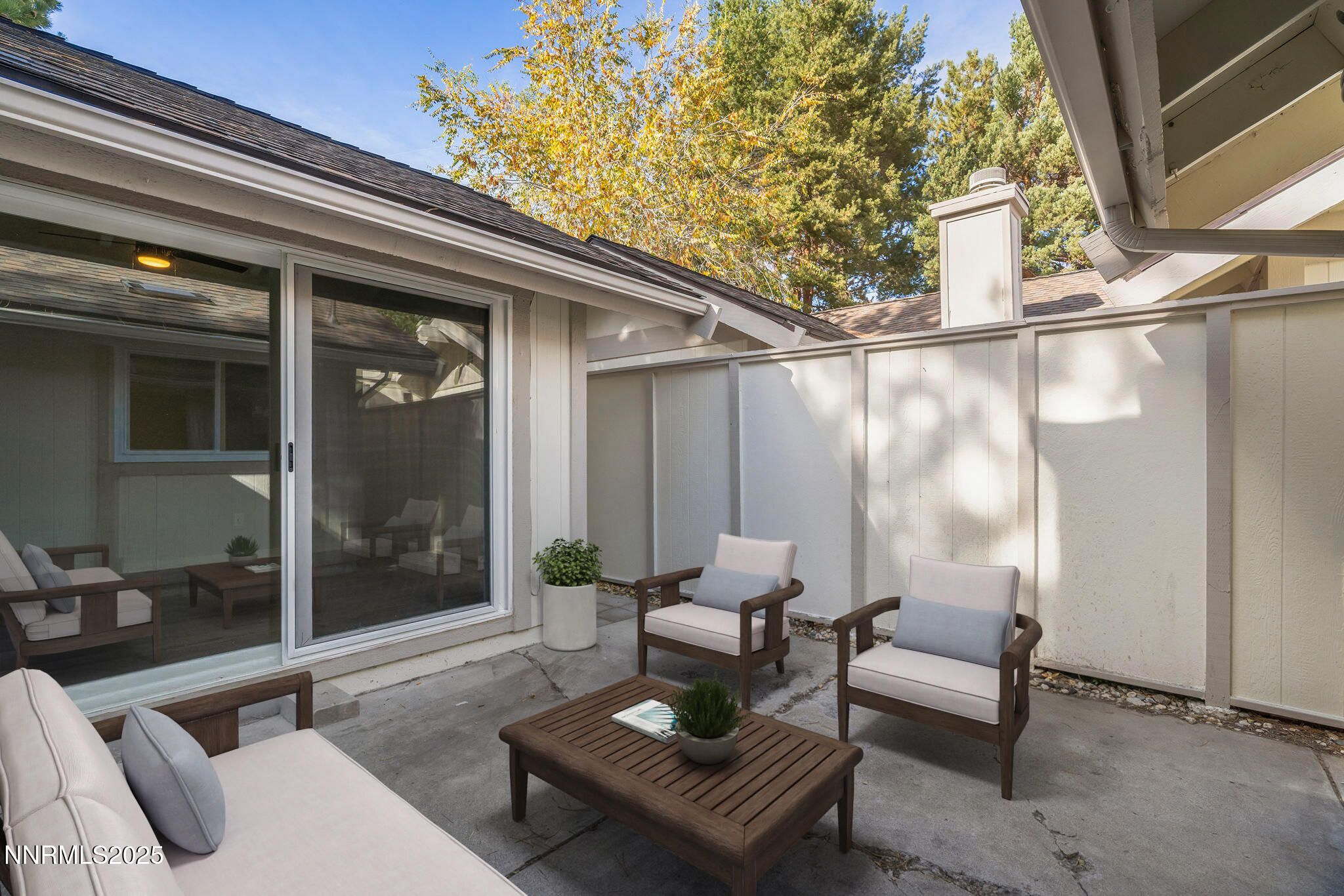 1149 Wagon Wheel Circle Reno, NV 89503 - Photo 17 of 19 a outdoor living space with furniture and a potted plant