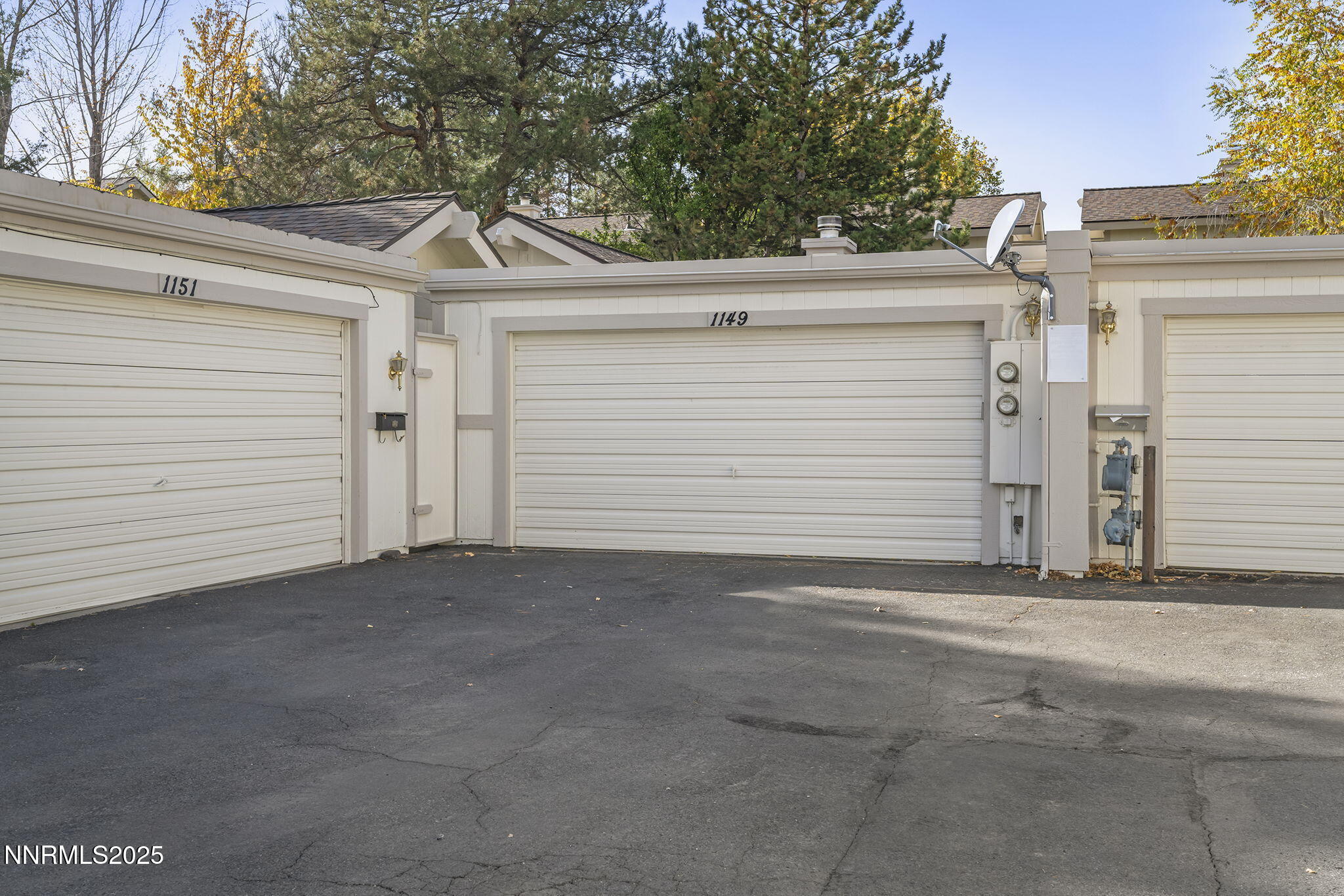 1149 Wagon Wheel Circle Reno, NV 89503 - Photo 18 of 19 a view of a white house with a outdoor space