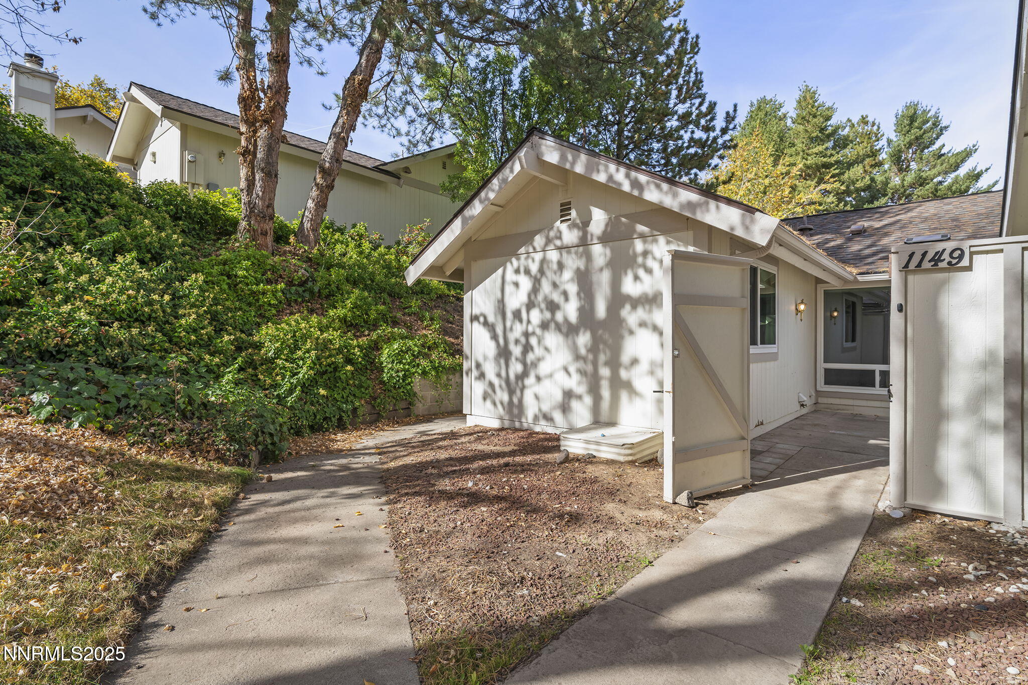 1149 Wagon Wheel Circle Reno, NV 89503 - Photo 2 of 19 a view of a house with a yard