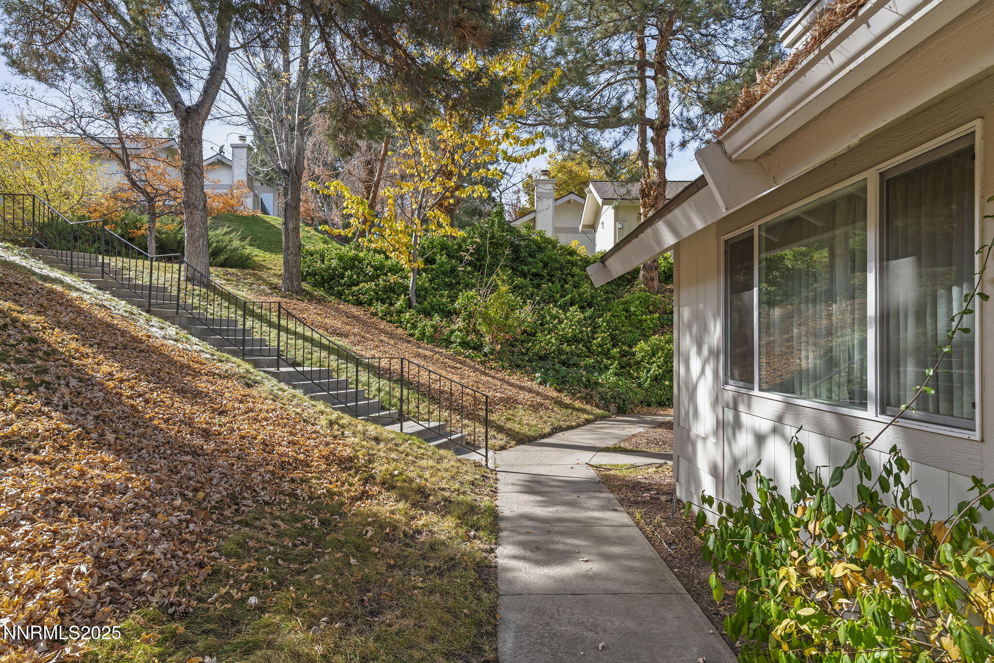 1149 Wagon Wheel Circle Reno, NV 89503 - Photo 3 of 19 a view of a house with a yard